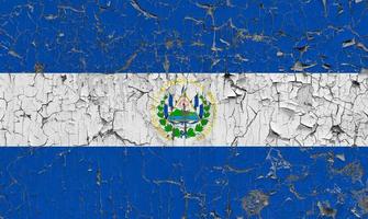 3D Flag of El Salvador on stone wall photo