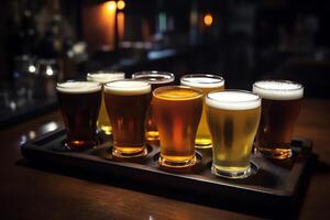 Assorted beer on pub bar table. photo