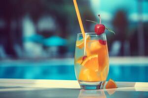 Summer cocktail on pool background. photo