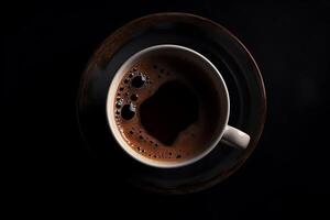 Delicious coffee cup on dark background, top view. photo