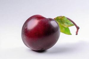 Fresh blue plum with leaf, isolate on white background. Macro studio shot. . photo