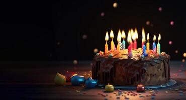 Close-up of a birthday cake with burning candles on a dark background, isolate. . photo