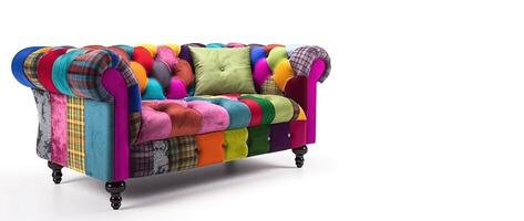 Chesterfield sofa from multi-colored fabric, patchwork, on a white background. . photo