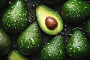 Avocado covered with drops of water. studio light. Avocado background. photo