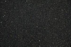 Close up Black Asphalt Texture Background. photo