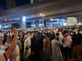 Mecca, Saudi Arabia, April 2023 - Pilgrims from different countries of the world are outside Masjid al-Haram, Makkah on the twenty-seventh night of Ramadan. photo