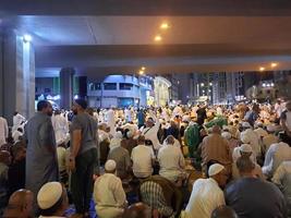 Mecca, Saudi Arabia, April 2023 - Pilgrims from different countries of the world are outside Masjid al-Haram, Makkah on the twenty-seventh night of Ramadan. photo