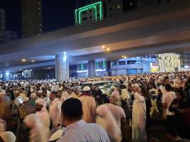 Mecca, Saudi Arabia, April 2023 - Pilgrims from different countries of the world are outside Masjid al-Haram, Makkah on the twenty-seventh night of Ramadan. photo
