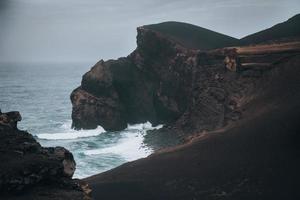 Lighthouse of Ponta dos Capelinhos in Faial, the Azores photo