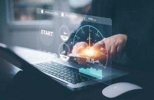 Fast internet connection with Metaverse technology concept, Programmer people working  laptop with Virtual screen of Internet speed measurement, Internet and technology concept, 6G High-speed internet photo