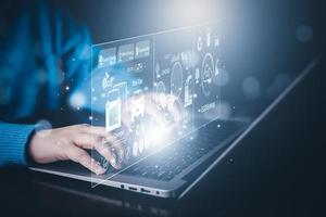 Man using laptop with global network connection with virtual modern reduce CO2 emission concept with icons, global warming emissions carbon footprint climate change to limit global warming, energy photo