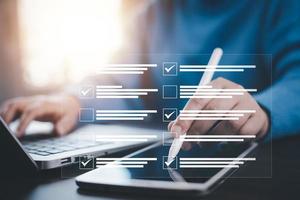 checklist and clipboard task documentation management, business people working laptop checklist questionnaire assessment form, online survey online exam Choosing the right answer in the exam photo