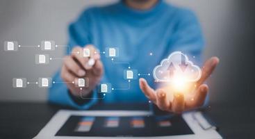 Business people using laptop with cloud computing system , Storage and data transfer Cloud network, Cloud technology. Networking and internet service, sharing download and upload and internet service photo