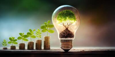 The tree in the lightbulb, coins with plants and . photo