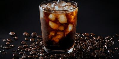 The glass of Ice Americano coffee in the black background with . photo