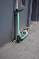 Electric Scooter on the Sidewalk photo