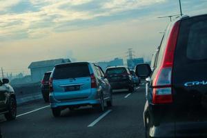 West Java, Indonesia in April 2023. The traffic jam that occurred on the Jakarta Cikampek 2 elevated toll road or known as the MBZ Mohammad Bin Zayed toll road photo