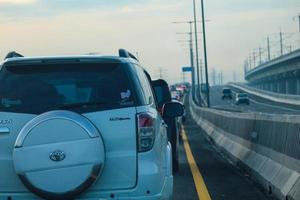 West Java, Indonesia in April 2023. The traffic jam that occurred on the Jakarta Cikampek 2 elevated toll road or known as the MBZ Mohammad Bin Zayed toll road photo