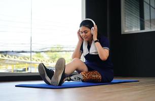 Young female with one prosthetic leg with the practice of using prosthetic legs to walk, exercise and and daily activities photo