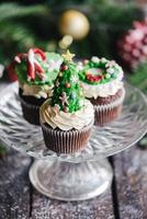 Christmas cup cakes served photo