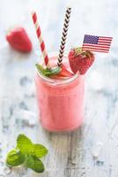 Strawberry smoothie in the jar photo