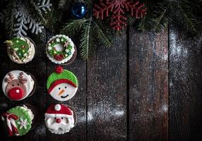 Cup cakes with Christmas decoration photo