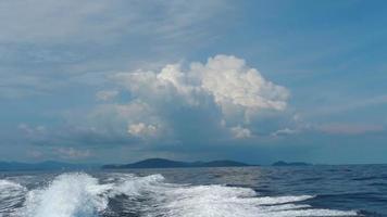 View of the waves from the speedboat. Beautiful landscape of the island. Tourism and travel concept video