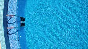 Topview from a drone over the surface of the pool video