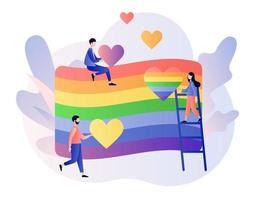 LGBT movement concept. Tiny people with Rainbow coloured flag and hearts. Love is love. Love parade. Modern flat cartoon style. Vector illustration on white background