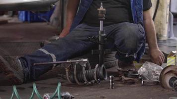 Car Suspension Shock Absorber Repair and Replacement at the Repair Shop video
