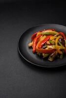 Delicious vegetables steamed peppers, asparagus beans and potatoes photo