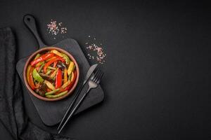 Delicious vegetables steamed peppers, asparagus beans and potatoes photo