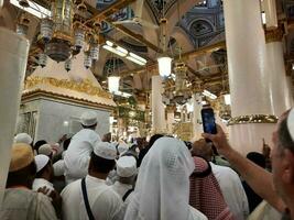 Medina, Saudi Arabia, April 2023 - Muslim pilgrims are going to visit Roza Rasool at Masjid Al Nabawi Madinah. photo