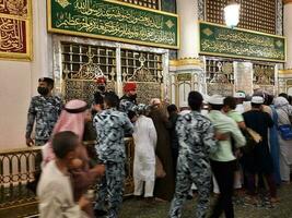 Medina, Saudi Arabia, April 2023 - Muslim pilgrims are going to visit Roza Rasool at Masjid Al Nabawi Madinah. photo