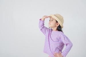 Image of Asian child posing on white  background photo