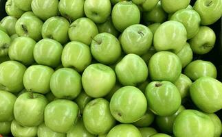 Green apple raw fruit and vegetables overhead perspective background, part of healthy organic fresh products photo
