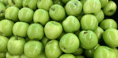 Green apple raw fruit and vegetables overhead perspective background, part of healthy organic fresh products photo