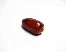 Close up of dried date fruit isolated on white background photo