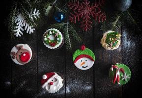 Cup cakes with Christmas decoration photo