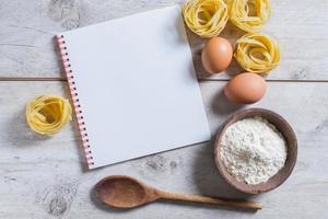 Tagliatelle and cook book photo