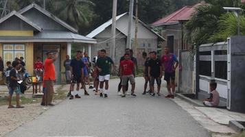 Gorontalo, March 2023 - Marathon running race, people feet on city road. Running people at a Marathon competition photo