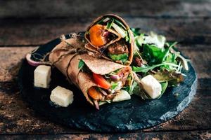 Tortilla wraps with ground meat photo