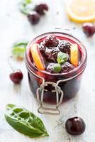 Black cherry jam in the jar photo