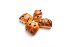 top view a group of buns with raisin toppings isolated on solid white background. photo