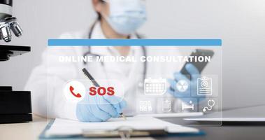 Smart phone with SOS online medical consultation concept, Doctors specialize in telephone assistance for consulting contact, medical secret, emergency online medical, appointment by email or phone photo