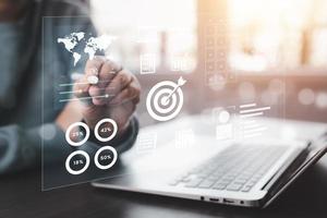 Working Data Analytics and Data Management Systems and Metrics connected to corporate strategy database for Finance, Intelligence,  Business Analytics with Key Performance Indicators, social network photo
