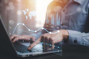 Working Data Analytics and Data Management Systems and Metrics connected to corporate strategy database for Finance, Intelligence,  Business Analytics with Key Performance Indicators, social network photo