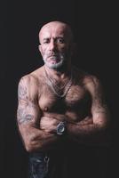 Portrait of tattooed man photo