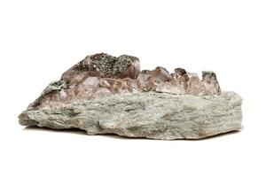 Macro mineral stone quartz chlorite Palygorskite rock on a white background photo
