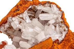 Macro mineral stone crystals Hemimorphite rock on a white background photo